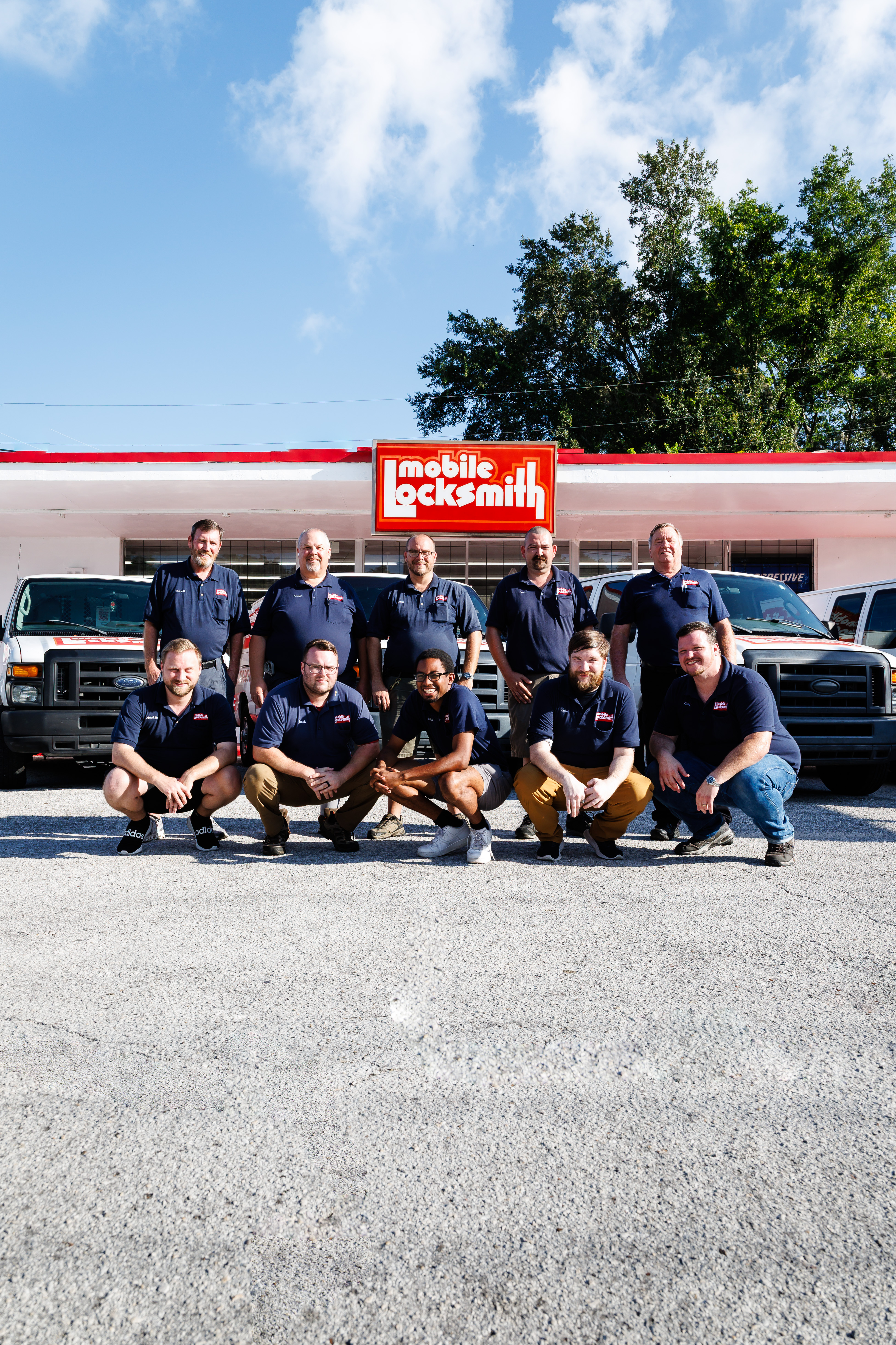 Mobile Locksmith team portrait at Gainesville storefront Mobile Locksmith team portrait at Gainesville storefront